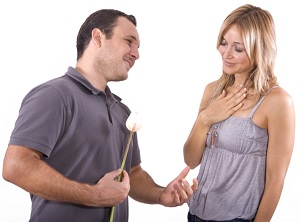 Man Giving Woman Flowers Image