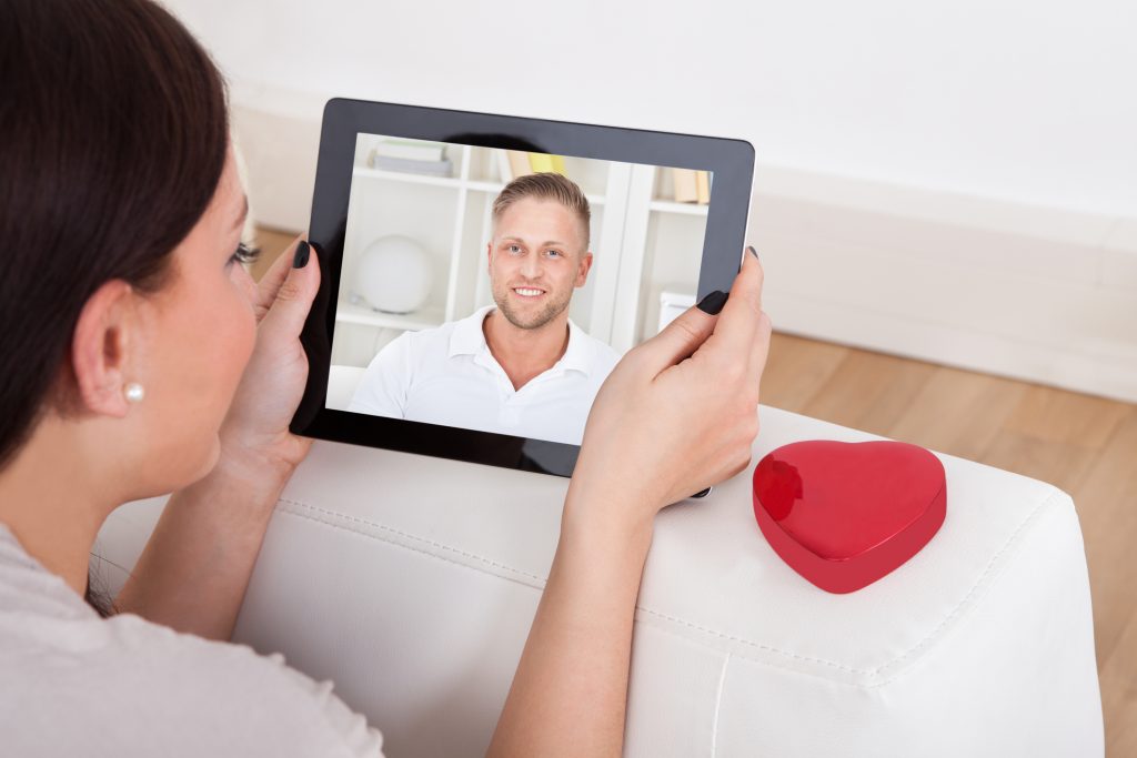 Woman on a virtual date hoping this man is open to love.