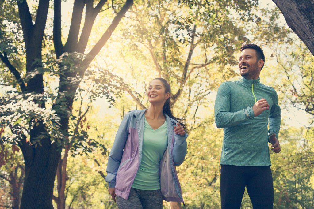 Couple going for a hike as a low-budget date.