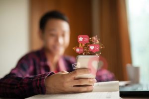 A woman has online dating success as she looks at her dating app and finds lots of matches.