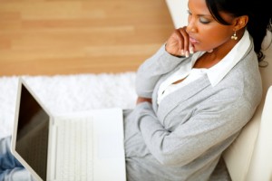http://www.dreamstime.com/royalty-free-stock-photo-pensive-attractive-woman-sitting-floor-image25887695
