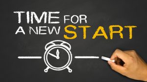 Chalk drawing with the saying "Time for a new start."