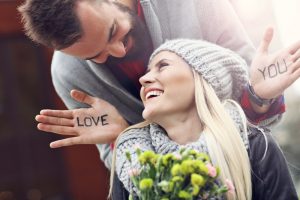 Cute loving couple sharing a moment because they each knew where to find quality marriage minded singles.