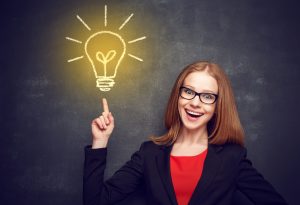 Woman who's just had a lightbulb moment.