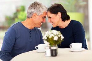 Couple smiling and looking into each other's eyes