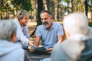 New friends being proactive about finding love by organizing a camping trip.