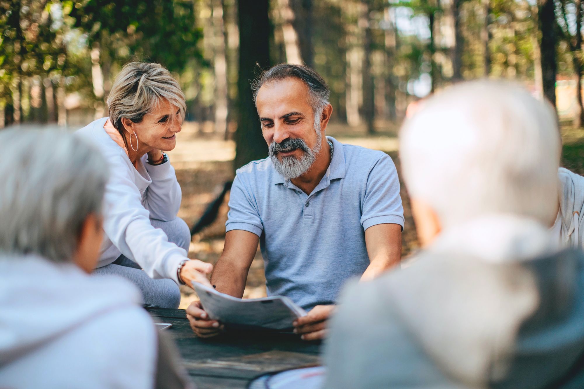 New friends being proactive about finding love by organizing a camping trip.