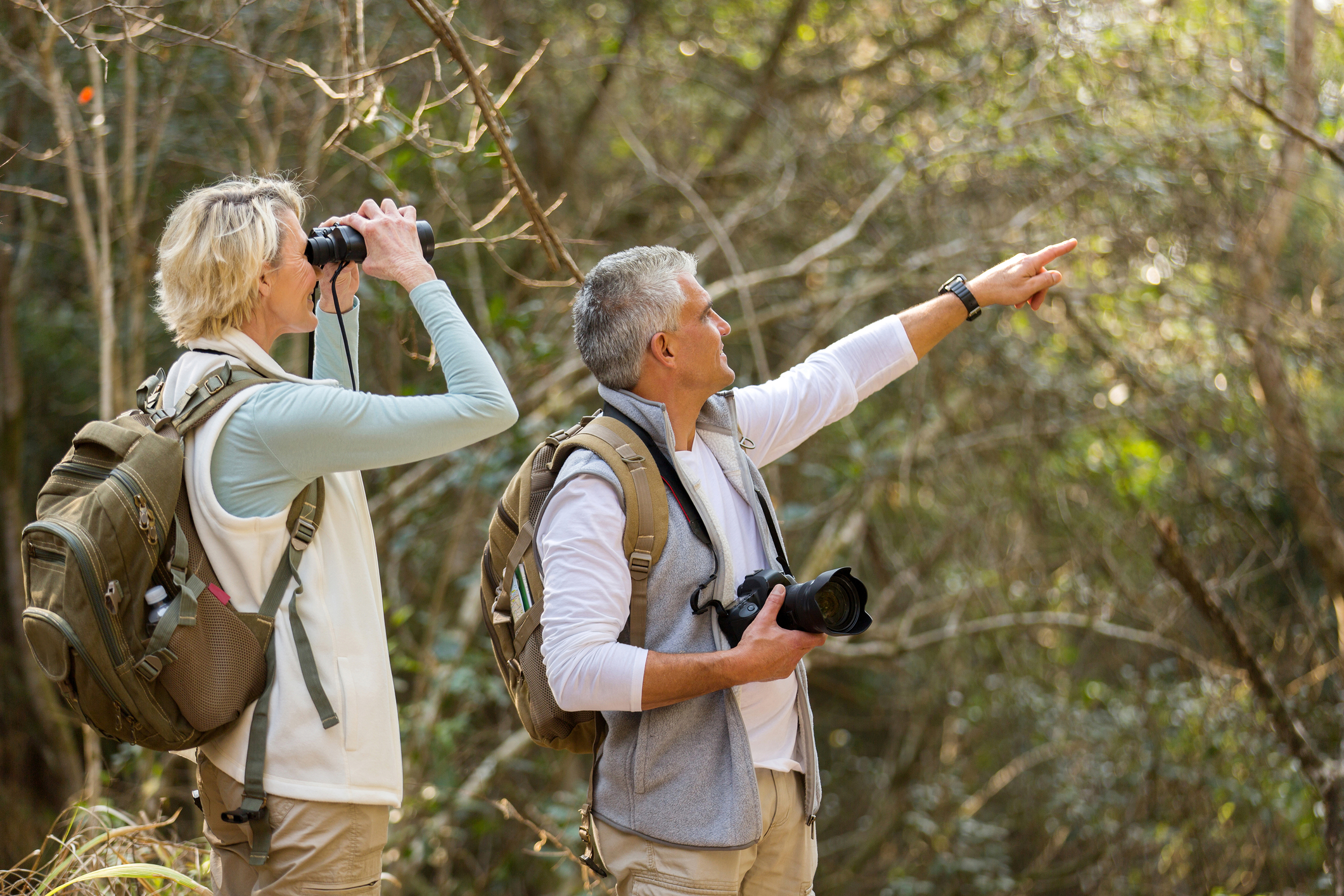 Couple who have made a deep connection hiking together and birdwatching.